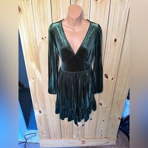 Forest green velvet dress with ruffle skirt hem